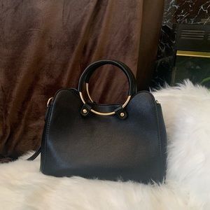 FREE w/$15 purchase. Like new, no signs of wear, black purse